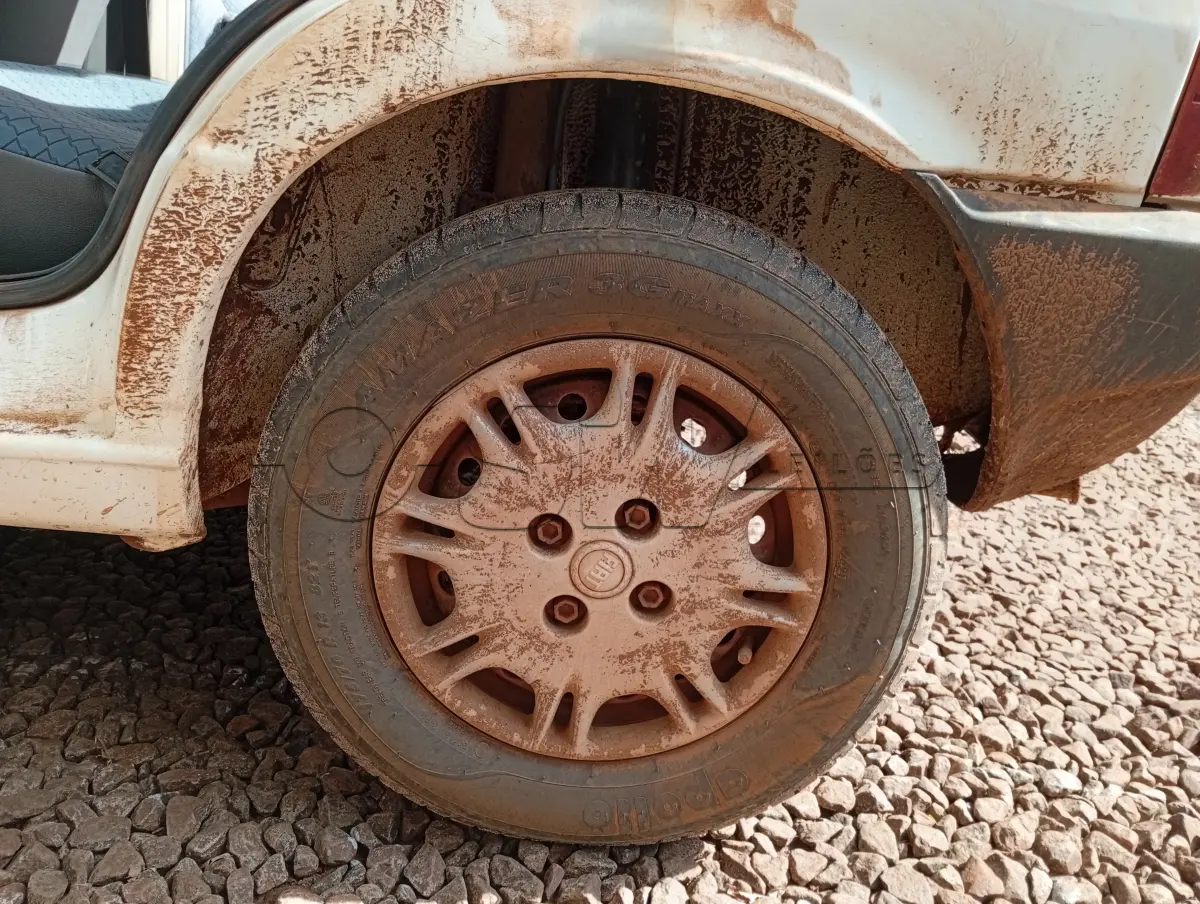 LOTE 029 - AUTOMÓVEL PASSAGEIRO, FIAT UNO MILE FIRE Placas IKX9H00, RENAVAM 00793953723