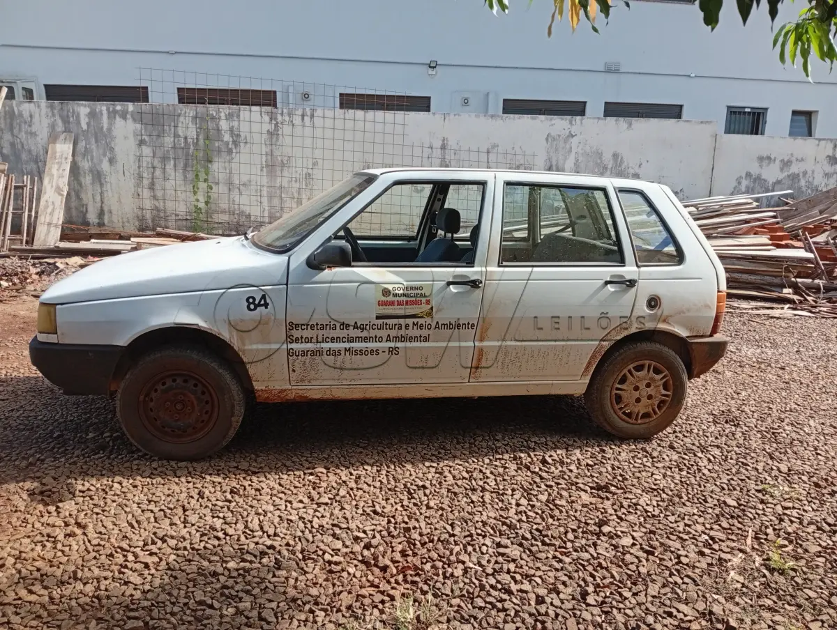 LOTE 029 - AUTOMÓVEL PASSAGEIRO, FIAT UNO MILE FIRE Placas IKX9H00, RENAVAM 00793953723