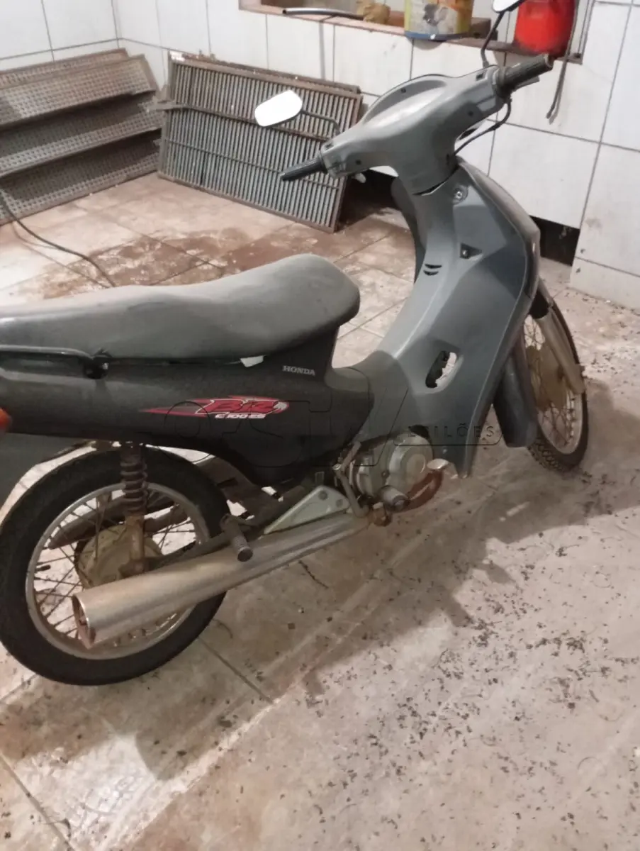 LOTE 011 - HONDA/C100 BIZ