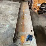 LOTE 014 - Lote composto de três conchas para retroescavadeiras e uma lâmina para moto niveladora.