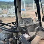 LOTE 004 - Retroescavadeira Articulada, marca JCB, equipada com concha dianteira vazada